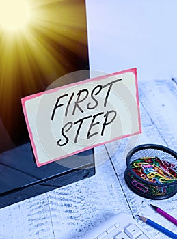 Writing note showing First Step. Business photo showcasing The first of a series of actions Act of starting something Note paper