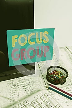 Writing note showing Focus Group. Business photo showcasing showing assembled to participate in discussion about