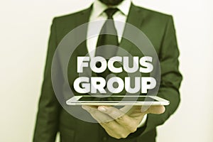 Writing note showing Focus Group. Business photo showcasing showing assembled to participate in discussion about
