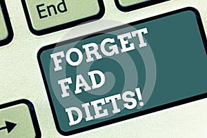 Writing note showing Forget Fad Diets. Business photo showcasing drop pounds due unhealthy calorie reduction or water