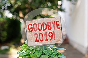 Writing note showing Goodbye 2019. Business photo showcasing express good wishes when parting or at the end of last year