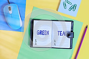 Writing note showing Green Tea. Business photo showcasing type of tea that is made from Camellia sinensis leaves and buds Locked