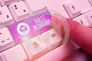 Writing note showing Guest Blogging. Business photo showcasing used by the owners of blogs to increase traffic to their site