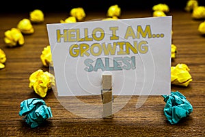 Writing note showing Hello I Am... Growing Sales. Business photo showcasing Making more money Selling larger quantities Written no