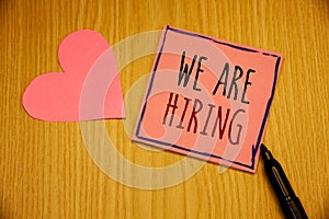 Writing note showing We Are Hiring. Business photos showcasing Talent Hunting Job Position Wanted Workforce HR Recruitment
