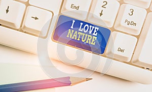 Writing note showing I Love Nature. Business photo showcasing Enjoy the natural environment Preservation Protect