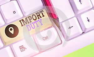 Writing note showing Import Duty. Business photo showcasing tax imposed by a government on goods from other countries.