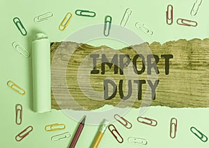 Writing note showing Import Duty. Business photo showcasing tax imposed by a government on goods from other countries