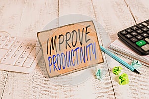 Writing note showing Improve Productivity. Business photo showcasing to increase the machine and process efficiency