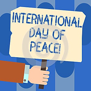 Writing note showing International Day Of Peace. Business photo showcasing Worldwide peaceful celebration Hope freedom