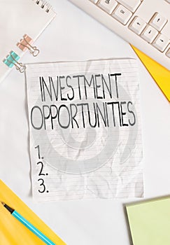 Writing note showing Investment Opportunities. Business photo showcasing a Purchase that has a chance to Gain Value