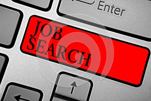 Writing note showing Job Search. Business photo showcasing An act of person to find work suited for his profession Keyboard red ke photo