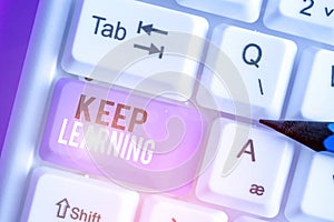 Writing note showing Keep Learning. Business photo showcasing Life long and selfmotivated pursuit of knowledge and ideas