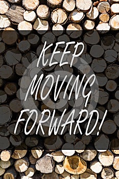 Writing note showing Keep Moving Forward. Business photo showcasing Optimism Progress Persevere Move Wooden background