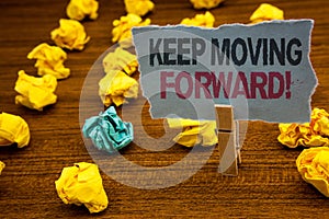 Writing note showing Keep Moving Forward Motivational Call. Business photo showcasing Optimism Progress Persevere Move Cardboard