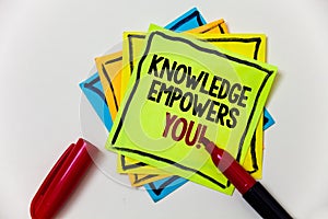 Writing note showing Knowledge Empowers You Call. Business photo showcasing Education responsible to achieve your success Pen mar