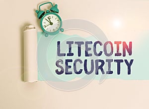 Writing note showing Litecoin Security. Business photo showcasing peertopeer cryptocurrency and opensource software Alarm clock