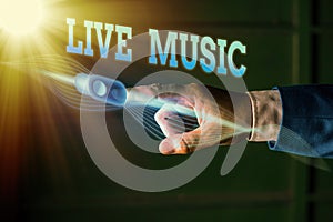 Writing note showing Live Music. Business photo showcasing performance given by one or more singers or instrumentalists photo