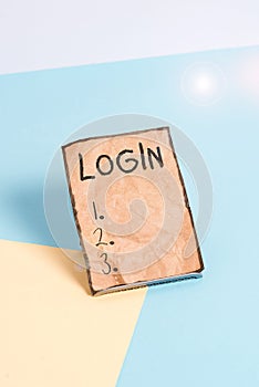 Writing note showing Login. Business photo showcasing Entering website Blog using username and password Registration Paper on