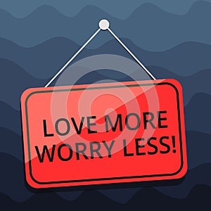 Writing note showing Love More Worry Less. Business photo showcasing Have a good attitude motivation be lovable enjoy