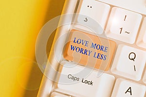 Writing note showing Love More Worry Less. Business photo showcasing Have a good attitude motivation be lovable enjoy