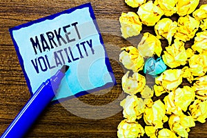 Writing note showing Market Volatility. Business photo showcasing Underlying securities prices fluctuates Stability status