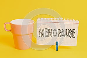 Writing note showing Menopause. Business photo showcasing Period of peranalysisent cessation or end of menstruation