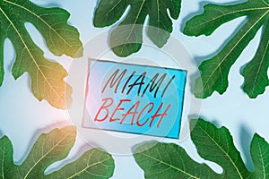 Writing note showing Miami Beach. Business photo showcasing the coastal resort city in MiamiDade County of Florida