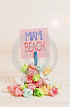 Writing note showing Miami Beach. Business photo showcasing the coastal resort city in MiamiDade County of Florida