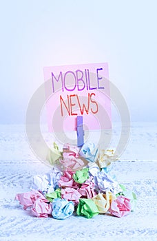 Writing note showing Mobile News. Business photo showcasing the delivery and creation of news using mobile devices
