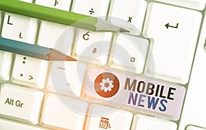 Writing note showing Mobile News. Business photo showcasing the delivery and creation of news using mobile devices.