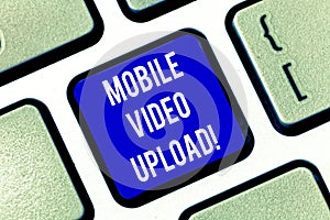 Writing note showing Mobile Video Upload. Business photo showcasing add videos on website or blog using cell phone