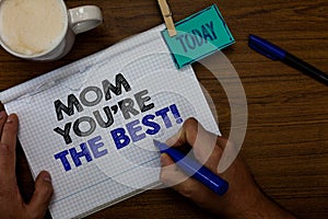 Writing note showing Mom You re are The Best. Business photo showcasing Appreciation for your mother love feelings compliment Hand