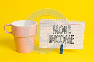 Writing note showing More Income. Business photo showcasing Additional money receives for an exchange of good or