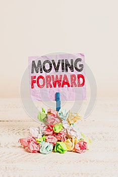 Writing note showing Moving Forward. Business photo showcasing Toward or at a place point or time in advance Onward Ahead Reminder
