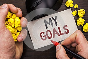 Writing note showing My Goals. Business photo showcasing Goal Aim Strategy Determination Career Plan Objective Target Vision writ