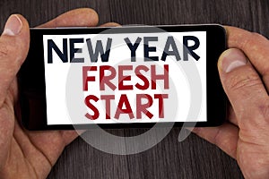 Writing note showing New Year Fresh Start. Business photo showcasing Time to follow resolutions reach out dream job written on Mo