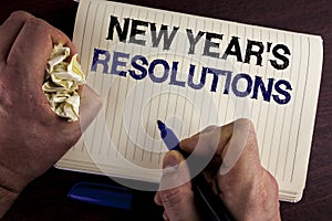 Writing note showing New Year'S Resolutions. Business photo showcasing Goals Objectives Targets Decisions for next 365 days writ