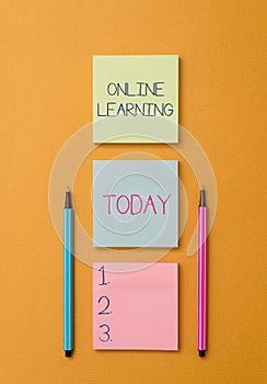 Writing note showing Online Learning. Business photo showcasing Larning with the assistance of the Internet and a photo