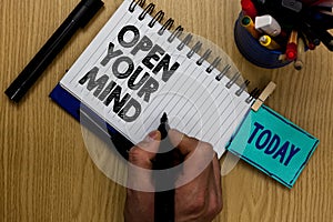 Writing note showing Open Your Mind. Business photo showcasing Be open-minded Accept new different things ideas situations Man hol