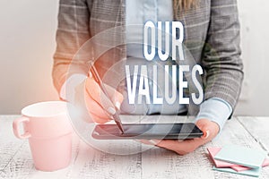 Writing note showing Our Values. Business photo showcasing list of morals companies or individuals commit to do them