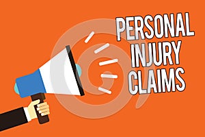 Writing note showing Personal Injury Claims. Business photo showcasing being hurt or injured inside work environment Man holding m