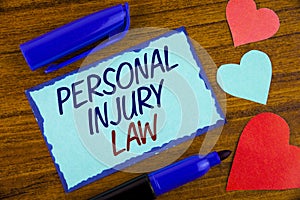 Writing note showing Personal Injury Law. Business photo showcasing guarantee your rights in case of hazards or risks written on