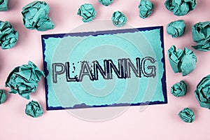 Writing note showing Planning. Business photo showcasing Defining strategies for achieving a goal Process of making plans written