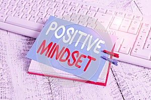 Writing note showing Positive Mindset. Business photo showcasing mental attitude in wich you expect favorable results notebook