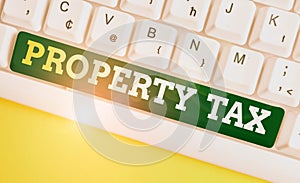 Writing note showing Property Tax. Business photo showcasing an ad valorem tax on the value of a property Millage rate