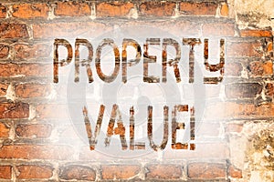 Writing note showing Property Value. Business photo showcasing Estimate of Worth Real Estate Residential Valuation Brick Wall art