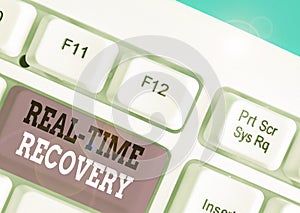 Writing note showing Real Time Recovery. Business photo showcasing maximum time period in which recent data can recover.