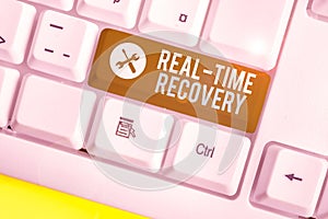 Writing note showing Real Time Recovery. Business photo showcasing maximum time period in which recent data can recover