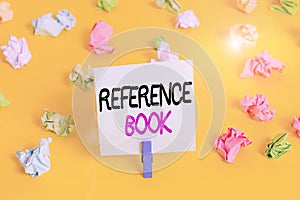 Writing note showing Reference Book. Business photo showcasing book to be consulted for information on specific matters Colored